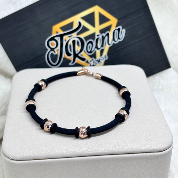 Pulsera Cauchos oro18k bolas diamantadas