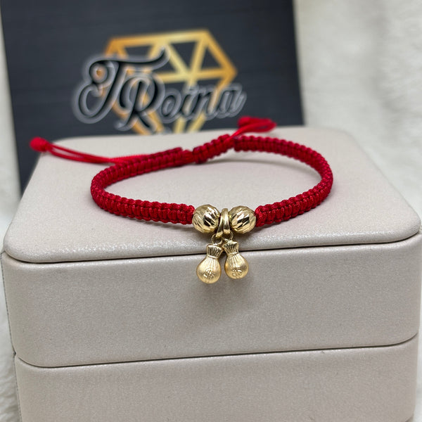 Pulsera tejida oro18kt bolsa de dinero