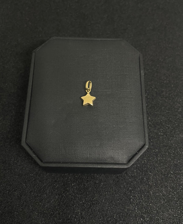DIJE MINI ESTRELLA 0,28D LARGO 1CM ANCHO 7MM NACÍ ORO 18KT