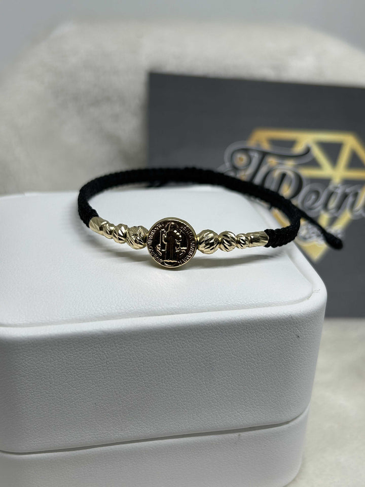 pulsera tejida san Benito Oro18kt